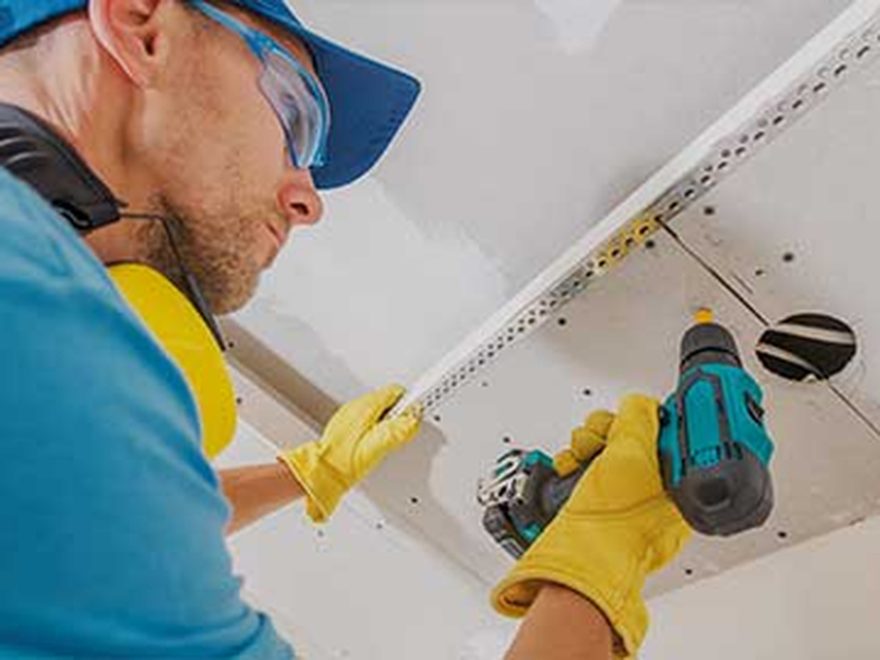 L&H Contractors crew installing a ceiling assembly